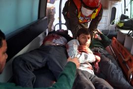 Pakistani rescue workers take out students from an ambulance who injured in the shootout at a school under attack by Taliban gunmen, upon arrival at a local hospital in Peshawar, Pakistan, Tuesday, Dec. 16, 2014. Taliban gunmen stormed a military school in the northwestern Pakistani city, killing and wounding dozens, officials said, in the latest militant violence to hit the already troubled region. (AP Photo/Mohammad Sajjad)
