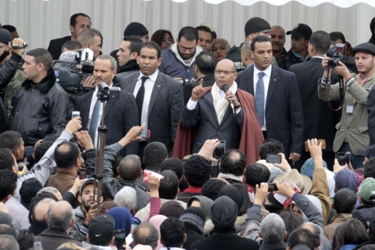 Tunisia's President Moncef Marzouki, who is seeking re-election, speaks during a presidential electoral campaign rally in Tunis December 9, 2014. Tunisia will hold the run-off of its first democratic presidential election on Dec. 21, between incumbent Marzouki and Beji Caid Essebsi, veteran leader of secularist party Nidaa Tounes, electoral authorities said on Monday. REUTERS/Zoubeir Souissi (TUNISIA - Tags: ELECTIONS POLITICS)