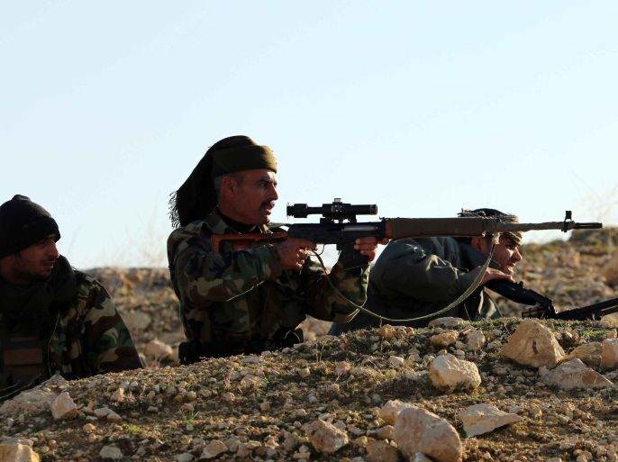 MOSUL, IRAQ - DECEMBER 21: Peshmerga forces take position in fight against Islamic State of Iraq and Levant (ISIL) members in Sinjar district of Mosul, Iraq on December 21, 2014.