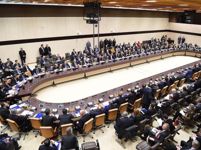Ministers and delegates of the 60-member coalition trying to crush the Islamic State militant group attend a high-level meeting at the NATO headquarters in Brussels on December 3, 2014. US Secretary of State John Kerry, Iraqi Prime Minister Haider al-Abadi and foreign ministers from European, Arab and other countries are meeting to discuss the best military strategy against the IS group, officials said. AFP PHOTO/EMMANUEL DUNAND