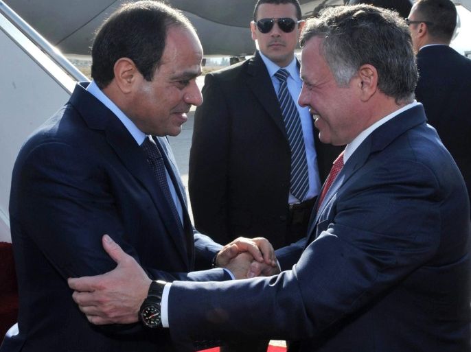 A handout picture made available by the Jordanian Royal Palace shows King of Jordan Abdullah II (R) shaking hands with Egyptian President Abdel Fattah El-Sissi upon his arrival at the Marka Military Airbase, Amman, Jordan, 11 December 2014. According to reports Egyptian President Abdel Fattah El-Sisi is on an official visit to Jordan to discuss ways of increasing bilateral relations between the two countries as well as regional and international issues of common concern. EPA/JAMAL NASRALLAH EPA/YOUSEF ALLAN / JORDANIAN ROYAL PALACE / HANDOUT HANDOUT EDITORIAL USE ONLY/NO SALES