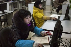 FILE - In this Jan. 9, 2013 file photo, North Koreans work at computer terminals inside the Grand People's Study House in Pyongyang, North Korea. North Korea is literally off the charts regarding Internet freedoms. There essentially aren’t any. But the country is increasingly online. Though it deliberately and meticulously keeps its people isolated and in the dark about the outside world, it knows it must enter the information age to survive in the global economy. (AP Photo/David Guttenfelder, File)