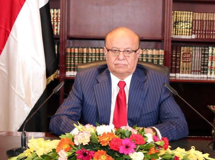 A handout photo released by the Yemeni Presidency Office shows Yemeni President Abdo Rabbo Mansour Hadi delivering a speech in his office at the Presidential Palace on the occasion of the 52nd anniversary of the National Day in Sana'a, Yemen, 25 September 2014. Yemen marked the 52nd anniversary of the 26th September Revolution against the rule of Imams and that saw Yemen proclaiming a republic. EPA/YEMENI PRESIDENCY OFFICE / HANDOUT