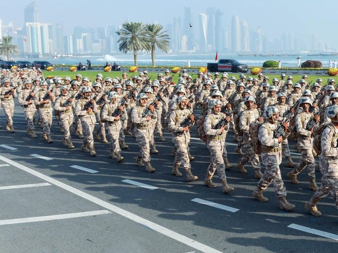 Qatari soldiers participate in a military parade to mark Qatar's National Day celebration, in Doha, Qatar, 18 December 2014. Qatar National Day marks Qatar's unification and independence in 1878 when Shaikh Jasim, the founder of the State, succeeded his father, Shaikh Muhammad Bin Thani, as the ruler and led the country towards unity.