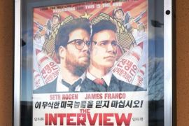 The poster for the film "The Interview" is seen outside the Alamo Drafthouse theater in Littleton, Colorado December 23, 2014. Sony Pictures said on Tuesday it will release "The Interview" to a limited number of theatres on December 25, less than a week after it cancelled the comedy's release following a devastating cyberattack blamed on North Korea. Sony's about-face came after it absorbed withering criticism, even from President Barack Obama for its decision last week to pull the film, which was seen not only as self-censorship in Hollywood but also caving into hackers working for North Korea. REUTERS/Rick Wilking (UNITED STATES - Tags: ENTERTAINMENT BUSINESS POLITICS SOCIETY SCIENCE TECHNOLOGY)