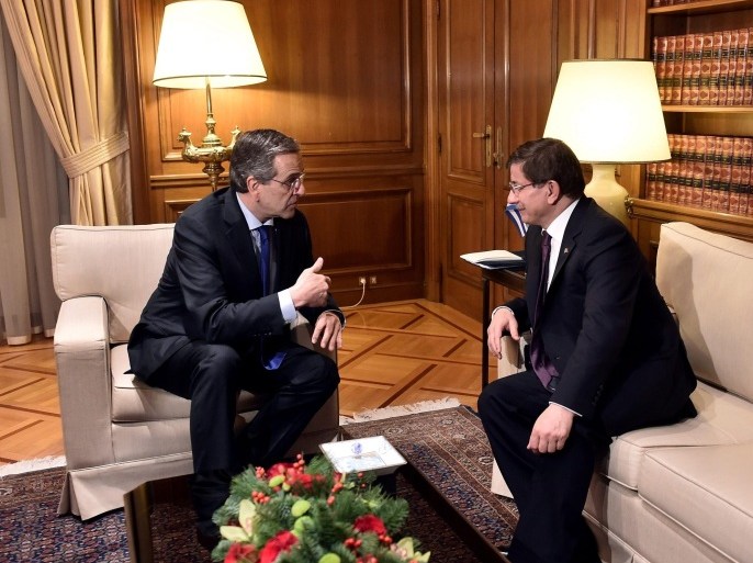 Greek Prime minister Antonis Samaras (L) speaks with Turkish Prime Minister Ahmet Davutoglu (R) during their meeting in Athens, Greece, 05 December 2014. Ahmet Davutoglu is in Athens on a two-day visit to attend the third Greece-Turkey High-Level Cooperation Council. The meeting will also be attended by the foreign ministers of Greece and Turkey, Evangelos Venizelos and Mevlut Cavusoglu.
