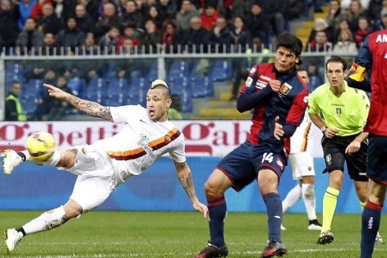 GENOA, ITALY - DECEMBER 14: Radja Nainggolan of AS Roma scores the opening goal during the Serie A match between Genoa CFC and AS Roma at Stadio Luigi Ferraris on December 14, 2014 in Genoa, Italy.