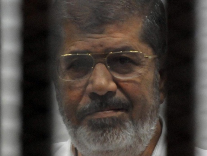 العسكر بذلوا جهودا محمومة لإيجاد مخرج قانوني لتبرير احتجاز مرسي(الفرنسية/غيتي-أرشيف)