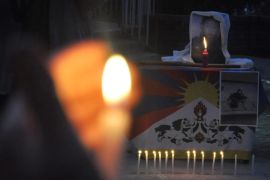 Tibetans living-in-exile take part in a candle light vigil for Tsepey Kyi after she self-immolated herself for the Tibet cause, at McLeod Ganj near Dharamsala, India, 23 December 2014. Tsepey Key set herself ablaze on 22 December and died in Sichuan. It was the second self-immolation protest against Chinese rule in Tibetan-populated areas.