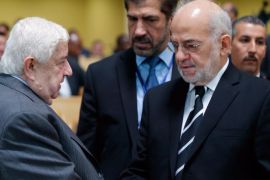 Syrian Foreign Minister Walid al-Moalem (L) talks with his Iraqi counterpart Ibrahim al-Jaffari (R) during the 'World against Violence and Extremism' conference, in Tehran, Iran, 09 December 2014. According to media reports, Iranian President Rowhani said that if regional countries can defeat the Islamic State (IS) militants if they can reach a common understanding. Foreign Ministers of Syria, Pakistan, Nicaragua and Iraq along with participants from some 40 countries are attending the conference.