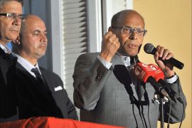 Tunisia's outgoing president Moncef Marzouki adresses his supporters at his campaign headquarters on December 23, 2014 in Tunis, a day after his rival Beji Caid Essebsi's victory in the presidential election. Essebsi, an 88-year-old veteran of previous governments, becomes the first president freely elected by Tunisians since independence from France in 1956