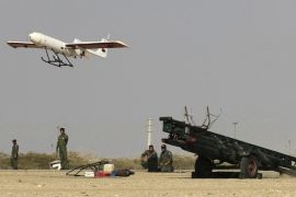 In this picture released by Jamejam Online on Thursday, Dec. 25, 2014, an Iranian made drone is launched during a military drill in Jask port, southern Iran. Iran's national army has begun a massive military drill near the strategic Strait of Hormuz at the entrance to the Persian Gulf, state TV reported on Thursday. (AP Photo/Jamejam Online, Chavosh Homavandi)