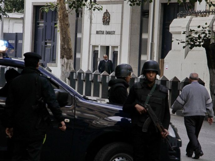 Security forces are deployed in front of the British embassy in Cairo, Egypt, which closed to the public for the second day on Monday, Dec. 8, 2014 over security concerns. The Canadian Embassy also announced its closure through a message on its main telephone number Monday. The British Embassy closed its offices to the public Sunday and Monday. Both embassies are in Cairo's Garden City neighbourhood. The nearby U.S. Embassy remained open.(AP Photo/Ahmed Abd El Latif, El Shorouk Newspaper) EGYPT OUT