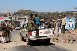 TAIZZ, YEMEN - DECEMBER 10: Houthi militants mount guard at a check point, to control entrance and exit to the city of Taizz as they plan to progress towards Taizz, in al Qaeda town close to Taizz,Yemen on December 10, 2014.
