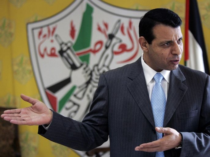 File - In this Jan. 3, 2011 file photo, Palestinian Fatah leader Mohammed Dahlan gestures as he speaks during an interview with The Associated Press in his office in the West Bank city of Ramallah. Banished in 2010 by Palestinian President Mahmoud Abbas, a former mentor, Dahlan has leveraged millions spent on needy Palestinians and his close ties with Egypt and the United Arab Emirates into growing political influence at home. (AP Photo/Majdi Mohammed, File)