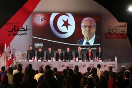 Head of the Tunisian ISIE election commission Chafik Sarsar (4-L) along with other members of the commission give a press conference to announce the final results of the presidential elections, in Tunis, Tunisia, 29 December 2014. The Tunisian Independent High Authority for Elections (ISIE) announced on 22 December that veteran politician Beji Caid Essibsi has won Tunisia's first free presidential elections with 55.68 per cent of the vote. The commission said his rival, outgoing President Moncef Marzouki, had received 44.32 per cent of the ballots. A swearing-in ceremony for Essebsi is scheduled for 31 December.