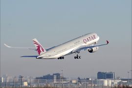 A Qatar Airways A350 takes off from the Airbus headquarters in Toulouse on December 22, 2014. Airbus delivered its first next-generation A350-900 plane to Qatar Airways in a formal ceremony that kickstarts its bid to erode rival Boeing's dominance in the lucrative long-haul market. AFP PHOTO / REMY GABALDA