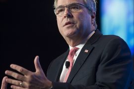 (FILES) This November 20, 2014 file photo shows former Florida Republican Governor Jeb Bush as he speaks at the 2014 National Summit on Education Reform in Washington, DC. Jeb Bush, brother and son to two former US presidents, threw his hat into the ring for the 2016 race on December 16, 2014, announcing he had consulted his family and decided to explore a bid. "As a result of these conversations and thoughtful consideration of the kind of strong leadership I think America needs, I have decided to actively explore the possibility of running for president," he said. AFP PHOTO / Saul LOEB