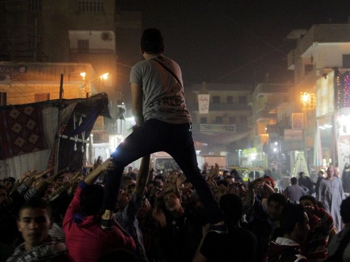 GIZA, EGYPT - DECEMBER 11: Hundreds of Egyptians called themselves 'Anti-coup' stage demonstrations at Badrashin Neighborhood in Giza, Egypt on December 11, 2014.