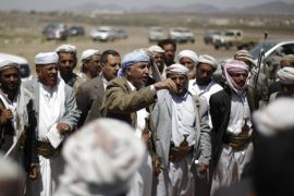 Yemeni tribesmen attend a tribal meeting to show their support for Yemeni army's anti-al-Qaida operations in the Arhab region, north of Sanaa, Yemen, Thursday, May 29, 2014. Yemen has been struggling for years with al-Qaida's branch here, known as al-Qaida in the Arabian Peninsula. During a yearlong uprising in 2011 that eventually overthrew longtime ruler Ali Abdullah Saleh, al-Qaida militants seized control of several towns and districts in the south, exploiting the security vacuum. They were driven out a year later by Yemeni forces backed by U.S. airstrikes. (AP Photo/Hani Mohammed)