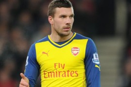 STOKE ON TRENT, ENGLAND - DECEMBER 06: Lukas Podolski of Arsenal during the Barclays Premier League match between Stoke City and Arsenal at the Britannia Stadium on December 6, 2014 in Stoke on Trent, England.