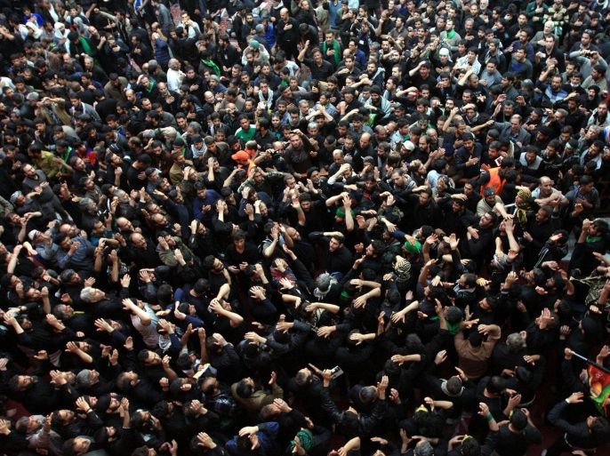Shiite pilgrims gather at the Imam Hussein shrine to take part in the religious ceremony of Arbain, Iraq, 13 December 2014. Shiite worshippers are gathering in the holy city of Karbala to perform the religious ceremony of Arbain, celebrated on the 40th day after Ashura which commemorates the death of Imam Hussein at the battle of Karbala, which this year is taking place amid hightened security given the ongoing unrest in Iraq, especially with the escalation in conflict connected to the military gains made by the self-described Sunni group calling themselves the Islamic State (IS).