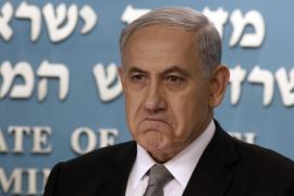 Israeli Prime Minister Benjamin Netanyahu gestures during a press conference in Jerusalem, Tuesday Dec. 2, 2014. Israel's prime minister fired two senior Cabinet ministers from his divided government Tuesday and said he would call early elections, plunging the country toward a heated campaign more than two years ahead of schedule. (AP Photo/Gali Tibbon, Pool)