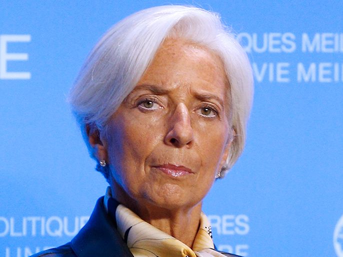 الموسوعة / epa04451284 International Monetary Fund (IMF) Managing Director Christine Lagarde listens during a meeting with with international economics organizations at the OECD headquarters in Paris, France, 17 October 2014. EPA/YOAN VALAT