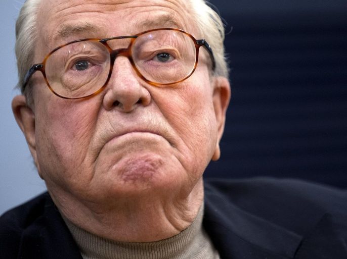 French far-right Front National (FN) party honorary president Jean-Marie Le Pen looks on during a press conference in Aubigny, western France, on January 17, 2015. Protesters gathered during Le Pen's visit holding signs reading 'Je suis Charlie' after Le Pen said on January 16 in an interview published in the Russian newspaper Komsomolskaya Pravda that the Paris attack at satirical weekly Charlie Hebdo 'bears the signature of [French] intelligence services'. AFP PHOTO / JEAN-SEBASTIEN EVRARD
