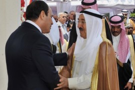 In this photo provided by Egypt's state news agency MENA, Egyptian President Abdel-Fattah el-Sissi, left, greets Kuwait's Emir Sheik Sabah Al-Ahmad Al-Jaber Al-Sabah during his inauguration ceremonies at the presidential palace in Cairo, Egypt, Sunday, June 8, 2014. El-Sissi was sworn in Sunday as president for a four-year term, assuming the highest office of a deeply polarized nation roiled by deadly unrest and an economic crisis since its Arab Spring uprising in 2011. (AP Photo/MENA)