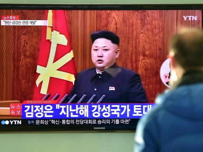 A South Korean man watches a television screen showing North Korean leader Kim Jong-Un's New Year speech, at a railroad station in Seoul on January 1, 2015. North Korean leader Kim Jong-Un said he was open to the 'highest-level' talks with South Korea as he called for an improvement in strained cross-border relations. AFP PHOTO / JUNG YEON-JE