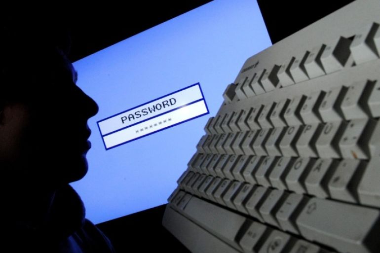 A file photo dated 23 January 2012 and made available on 21 January 2014 shows a silhouetted face in front of a computer screen with a fictive input mask for a password in Hanover, Germany. The login details of 16 million email users in Germany have been stolen, authorities confirmed on 21 January 2014. The security breach was confirmed by the Federal Office for Information Security (BSI), which has set up a website allowing internet users to ascertain whether their data has been accessed.