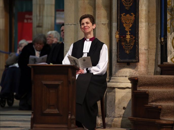 epaselect epa04585919 The Reverend Libby Lane smiles during a service at York Minster in York, Britain, 26 January 2015, during which she will be consecrated as the 8th Bishop of Stockport. The Reverend will officially become the Church of England's first woman bishop when she is consecrated at York Minister by The Archbishop of York, the Most Reverend John Sentamu. EPA/Lynne Cameron/PA Wire UK AND IRELAND OUT