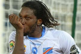Democratic Republic of the Congo's forward Dieudonne Mbokani celebrates after scoring a goal during the 2015 African Cup of Nations quarter final football match between Congo and Republic of the Congo in Bata, on January 31, 2015. AFP PHOTO / KHALED DESOUKI