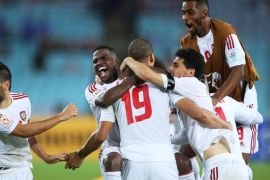 SYDNEY, AUSTRALIA - JANUARY 23: Ismail Ahmed of the United Arab Emirates celebrates with team mates after scoring the winning goal in a penalty shoot out during the 2015 Asian Cup Quarter Final match between Japan and the United Arab Emirates at ANZ Stadium on January 23, 2015 in Sydney, Australia.