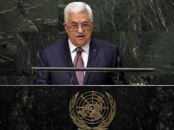FILE - In this file photo taken Friday, Sept. 26, 2014, Palestinian President Mahmoud Abbas addresses the 69th session of the United Nations General Assembly at U.N. headquarters. Israeli leaders on Sunday, Jan. 4, 2015, threatened to take tougher action against the Palestinians over their decision to join the International Criminal Court, a day after freezing the transfer of more than $100 million in tax funds. Last week's Palestinian decision to seek membership in the international court has infuriated Israel. (AP Photo/Richard Drew, File)
