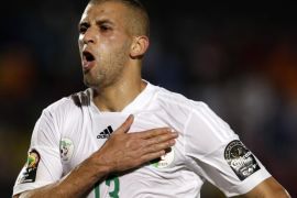Algeria's Islam Slimani celebrates after scoring a goal during the African Cup of Nations Group C soccer match against South Africa in Mongomo, Equatorial Guinea, Monday, Jan. 19, 2015. (AP Photo/Themba Hadebe)
