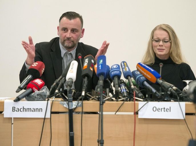 Lutz Bachmann (L), leader of the anti-Islamic Pegida (Patriotic Europeans Against the Islamisation of the Occident) movement and Pegida spokeswoman Kathrin Oertel give a press conference on January 19, 2015 in Dresden, easatern Germany. German police banned a planned rally by the movement and other public open-air gatherings in the eastern city of Dresden on January 19, 2015, citing a terrorist threat. AFP PHOTO / ROBERT MICHAEL