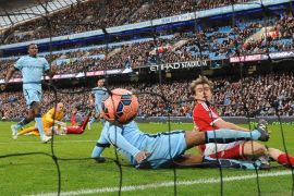 Middlesbrough's Patrick Bamford (R) shoots to score during the English FA Cup fourth round match between Manchester City and Middlesbrough at the Etihad Stadium in Manchester, Britain, 24 January 2015. EPA/NIGEL RODDIS http://www.epa.eu/files/TermsandConditions/DataCo_Terms_and_Conditions.pdf