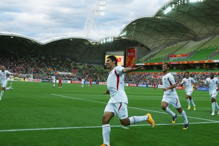 MELBOURNE, AUSTRALIA - JANUARY 16: Hamza Al Dardour of Jordan celebrates after he scored his third goal of the match during the 2015 Asian Cup match between Palestine and Jordan at AAMI Park on January 16, 2015 in Melbourne, Australia.
