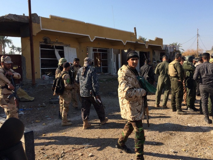 عناصر الجيش العراقي والحشد الشعبي تنتشر في أحد المواقع بالضلوعية شمال بغداد(الأوروبية)