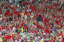 China fans cheer before the Asian Cup quarter-final soccer match between China and Australia at the Brisbane Stadium in Brisbane January 22, 2015. REUTERS/Edgar Su (AUSTRALIA - Tags: SPORT SOCCER)
