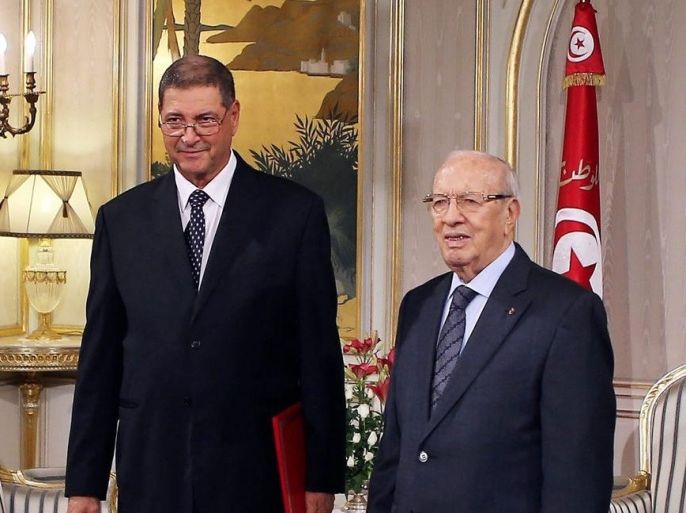 Newly-elected President Beji Caid Essebsi (R) stands with Prime Minister-designate, Habib Essid (L), Carthage Palace, Tunis, Tunisia, 05 January 2015. Habib Essid, former Interior Minister under the deposed President Ben Ali, is designated by the President, Beji Caid Essebsi, to appoint a government to be approved by a vote in Parliament.
