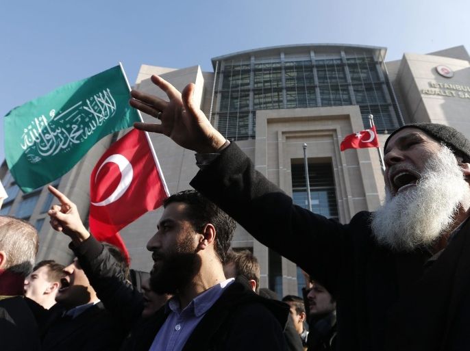 Islamist protesters shouts slogans against the Cumhuriyet Newspaper, during a protest in front of Istanbul Courthouse Headquarter, in Istanbul, Turkey, 15 January 2015. On early 14 January, Turkish Police raid the printing house of Cumhuriyet newspaper which published a four-page of selection of Charlie Hebdo's new issue for solidarity with the French magazine because of the deadly attack last week. The prosecution allowed the distribution after checking that cartoons representing the Prophet Muhammad were not included as a cover in the selection. A newspaper columnist put the cover as a small picture inside of the newspaper.