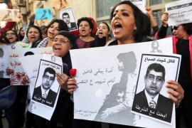 Egyptian women hold a poster of Egyptian Interior Minister, Mohammad Ibrahim, with the words written in Arabic 'killer Shaimaa al-Sabbagh' during a protest in downtown Cairo, Egypt, 29 January 2015. Socialist Popular Alliance members protested the death of Shaimaa al-Sabbagh who died 24 January 2015 during a peaceful commemoration of the fourth anniversary of the 25th January 2011 demonstrations which led to the fall of the Mubarak regime.