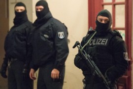 Members of a special German anti-terror police outside an apartment block in Perleberger Strasse, Berlin, 16 January 2015. German police arrested two people during an anti-terrorism operation in Berlin early 16 January 2014. The two men, 41 and 43 years old, are suspected of planning a major attack in Syria, lawyers and police said, with three other suspects still thought to be at large. There was reportedly no evidence that the men were planning an attack in Germany.
