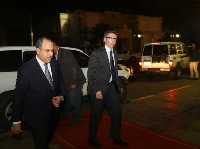In this Thursday, Jan. 9, 2015 photo, U.N. Special Envoy to Libya Bernardino Leon, center, arrives in Tripoli for meetings.(AP Photo/Mohammed Ben Khalifa)