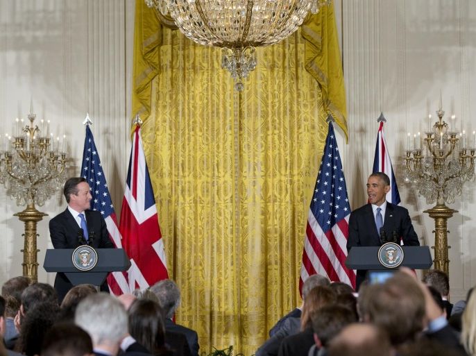 President Barack Obama and British Prime Minister David Cameron hold a joint news conference in the East Room of the White House in Washington, Friday, Jan. 16, 2015. Growing fears about the specter of terrorism in Europe and the West are lending themselves to a sense of trans-Atlantic solidarity as President Barack Obama and British Prime Minister David Cameron met at the White House. (AP Photo/Carolyn Kaster)