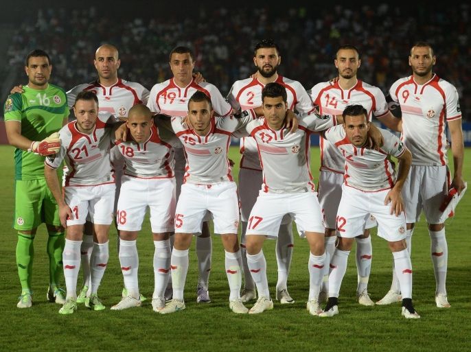 Tunisia's squad (top L-R) goalkeeper Aymen Mathlouthi, defender Aymen Abdennour, forward Saber Khalifa, defender Syam Ben Youssef, midfielder Stefan Nater, midfielder Yassine Chikhaoui, (bottom L-R) midfielder Jamel Saihi, midfielder Wahbi Khazri, midfielder Mohammed Moncer, defender Hamza Mathloudi and defender Ali Maaloul pose for a group picture ahead of the 2015 African Cup of Nations group B football match between Tunisia and Cape Verde in Ebebiyin on January 18, 2015. AFP PHOTO / KHALED DESOUKI