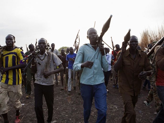 Members of the White Army, a South Sudanese anti-government militia, attend a rally in Nasir on April 14, 2014. Conflict in South Sudan has triggered a serious risk of famine that will kill up to 50,000 children within months if immediate action is not taken, the UN has warned. The African country has experienced high levels of malnutrition since it gained independence in 2011, UNICEF said, and conditions have worsened since ethnic conflict broke out between troops loyal to President Salva Kiir and supporters of his former deputy Riek Machar. AFP PHOTO / ZACHARIAS ABUBEKER
